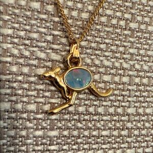 Gold tone, opal kangaroo necklace
